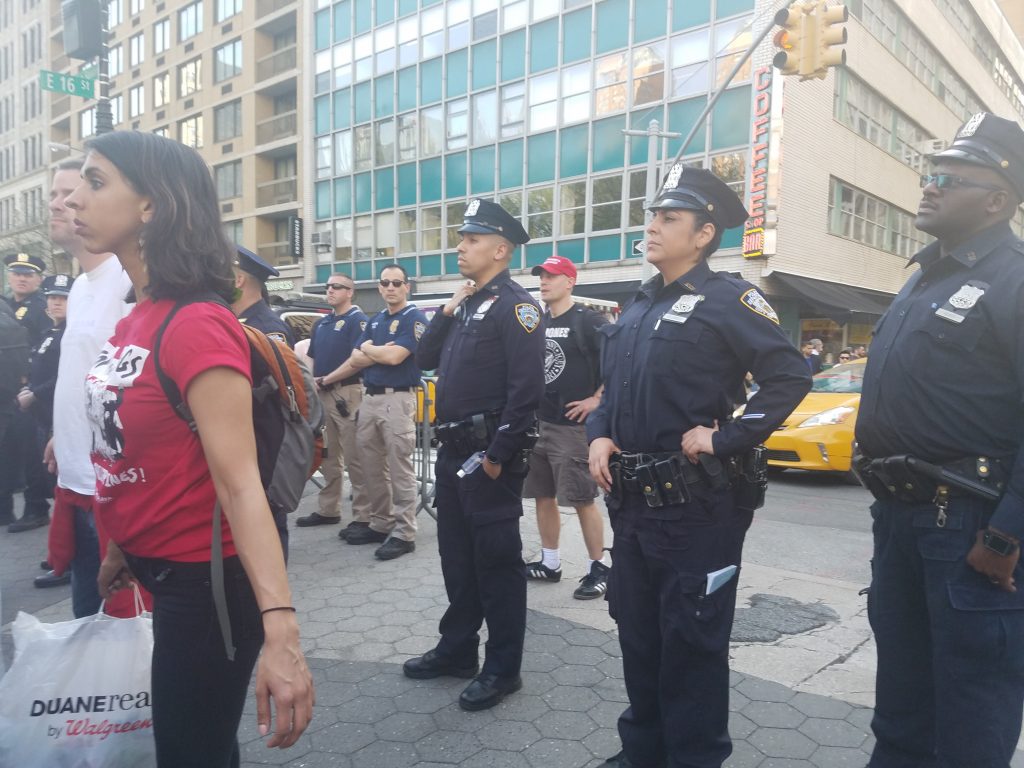 Photo of police officers at a May Day rally.